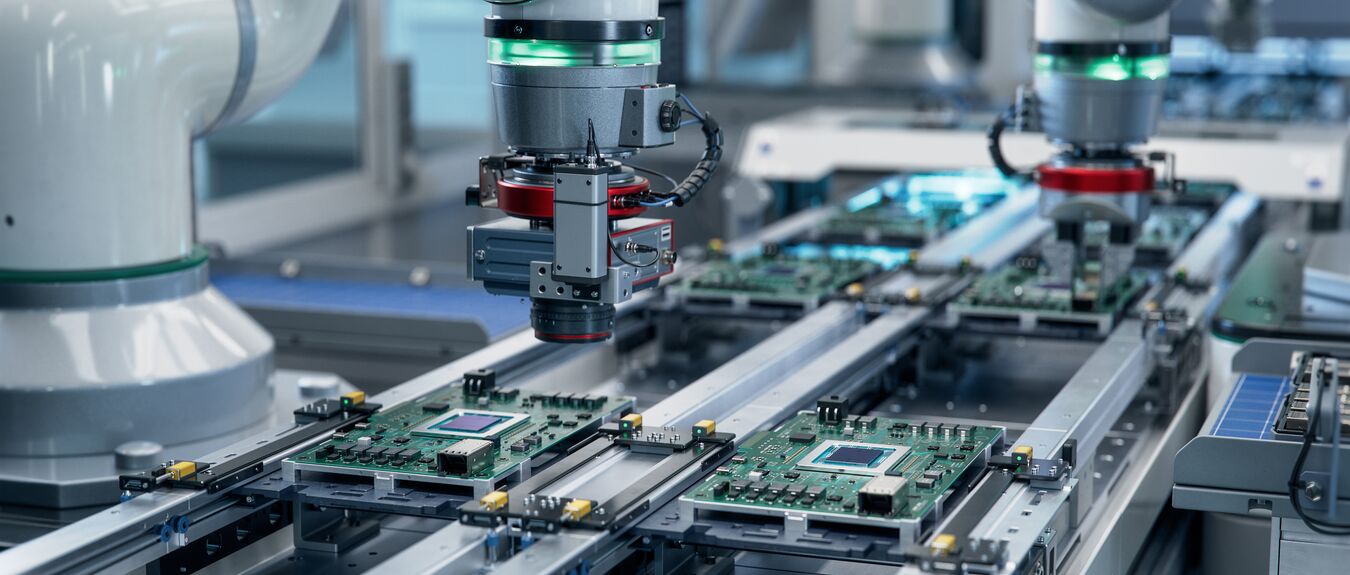 Component Installation and Quality Control of Circuit Board. Fully Automated PCB Assembly Line Equipped with High Precision Robot Arms at Electronics Factory.